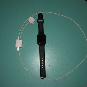 Apple series 2 42mm watch with charging cord